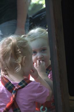 We caught this little girl kissing her own reflection in the Magic Mirror.