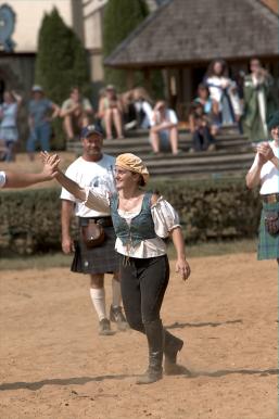 And she gets a high-five for being the first woman ever at the festival to do it!