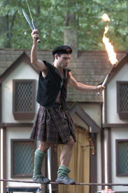 To celebrate, he juggles fire and knives.