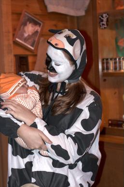 Forrest's wife holds a baby.